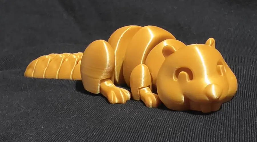 Articulated beaver, gold, front view