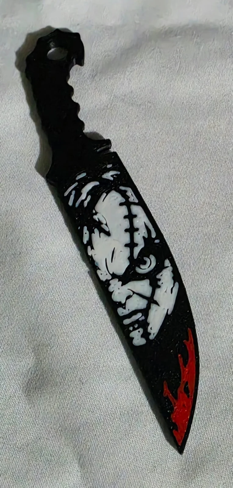 Frankenstein design knife keyring with red blade tip