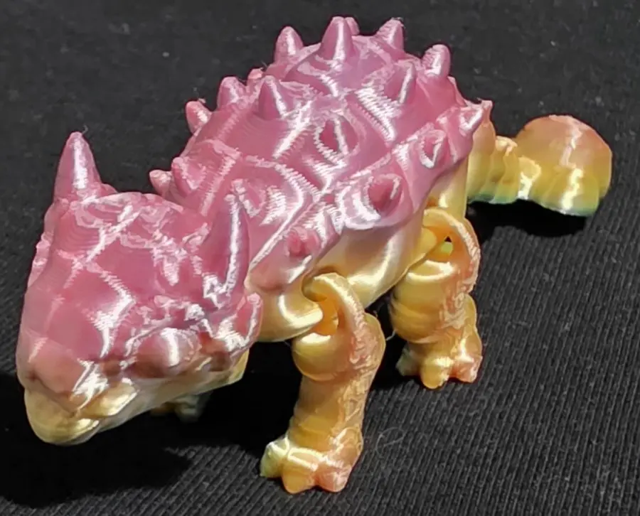 Large ankylosaurus, pink and gold, close up